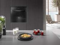 Miele M 7244 TC Einbau-Mikrowellengerät im perfekt kombinierbaren Design mit obenliegender Bedienung.